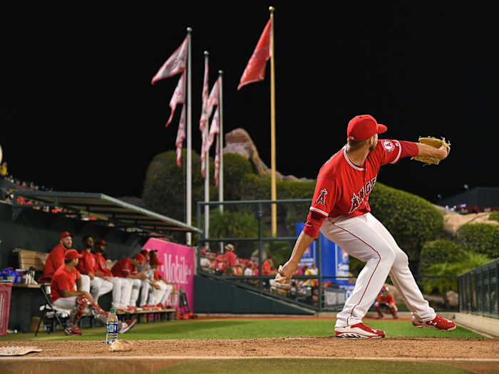 Angels pitcher throws a ball
